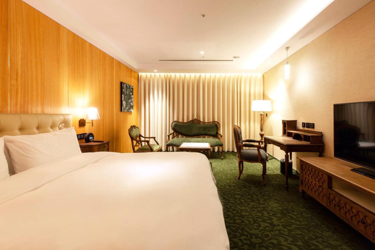 Inhouse Hotel Grand Tchaj-čung Pokoj fotografie